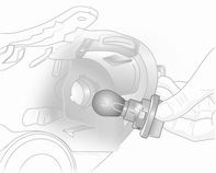 3. Glühlampe etwas in die Fassung hineindrücken, nach links drehen und herausnehmen.